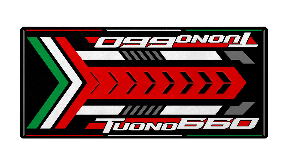 The Motorcycle Pit Mat for Tuono 660 features bold arrows and stripes in red, white, green, and black, evoking an Italian flag motif. The Tuono 660 text prominently appears on this racing-inspired motorcycle mat.