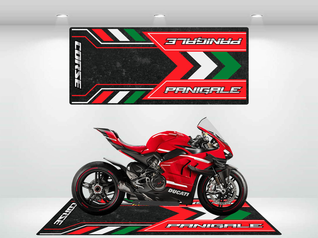 A red Ducati Panigale rests on a Motorcycle Pit Mats Corse Panigale racing-themed motorcycle mat. The backdrop, with black, green, red, and white hues, perfectly complements the design of the Motorcycle Mat for Panigale.