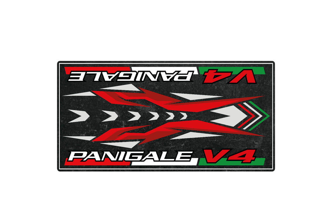 The Motorcycle Pit Mat for Panigale V4 features a red and white geometric design on black, bold Panigale V4 text, with green and gray accents forming a stylized arrow, ideal for any motorcycle garage.