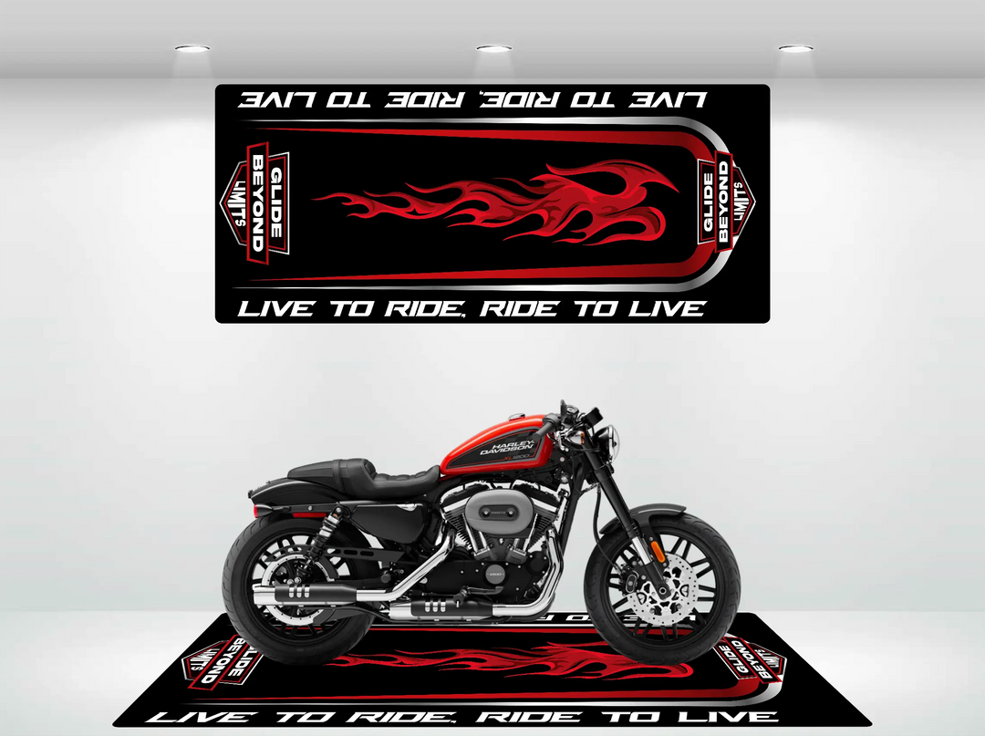 In a minimalistic room, a red and black motorcycle rests on the Motorcycle Mat for Glide Beyond Limits Universal by Motorcycle Pit Mat, displaying the words Live to Ride, Ride to Live. Complementing this is matching wall art with a red flame design and the same slogan.