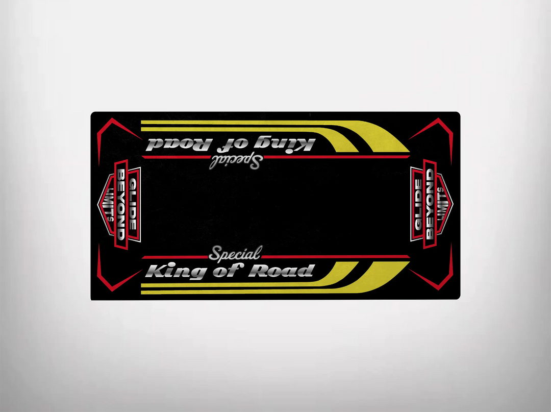 The Motorcycle Pit Mat offers a nostalgic vibe with the King of Road Special design, featuring white cursive lettering, yellow curved stripes, and red geometric accents on a black background—evoking the vintage spirit of a Harley Davidson ride.