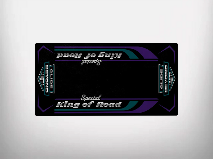 An upside-down image of a rectangular Motorcycle Mat for King of Road Special showcases Special King of Road in white and purple stylized text. The design echoes a Harley Davidson aesthetic with angular shapes, glowing teal and purple edges, on a neutral background. Brand: Motorcycle Pit Mat.