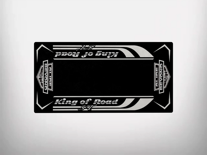 Rectangular black motorcycle mat with white stripes, featuring King of Road and S4 in bold. Known for durability, it has decorative patterns and the brand Motorcycle Pit Mat on edges, ideal for Harley Davidson enthusiasts.