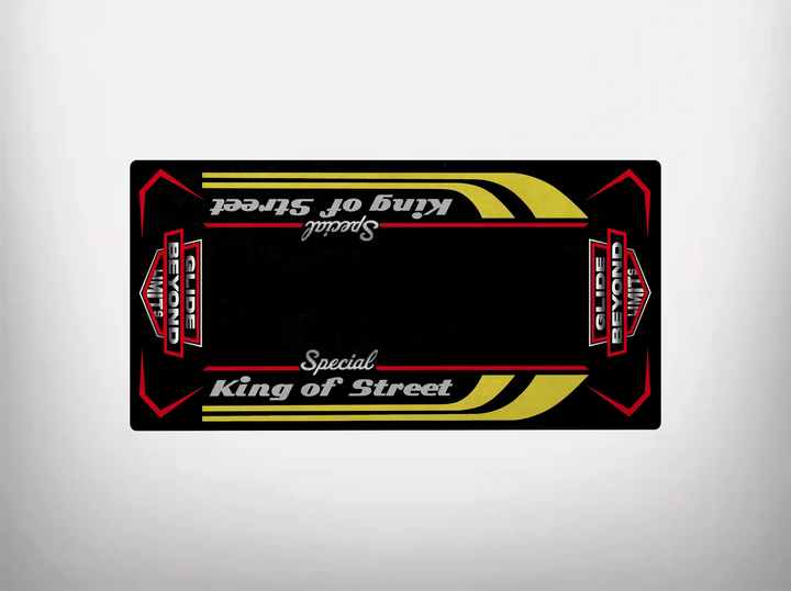 The Motorcycle Pit Mat Motorcycle Mat for King of Street Special features a black background with bold red and yellow Harley Davidson-inspired graphics. White Special King of Street text is decorated with stylized arrows, blending style and durability.