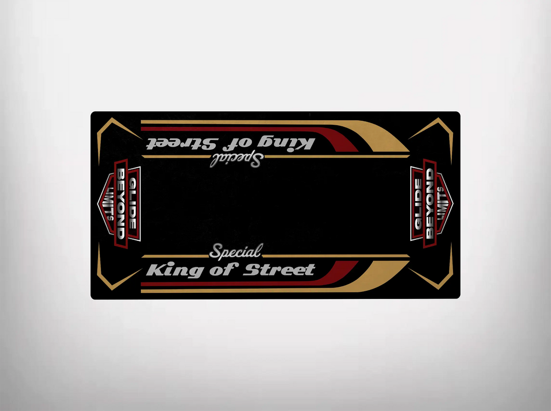 The Motorcycle Pit Mat, known as the Motorcycle Mat for King of Street Special, is a rectangular black mat featuring red and gold accents. Its upside-down Special King of Street and Globe Senior World lettering in white and red embodies the rebellious Harley Davidson spirit.