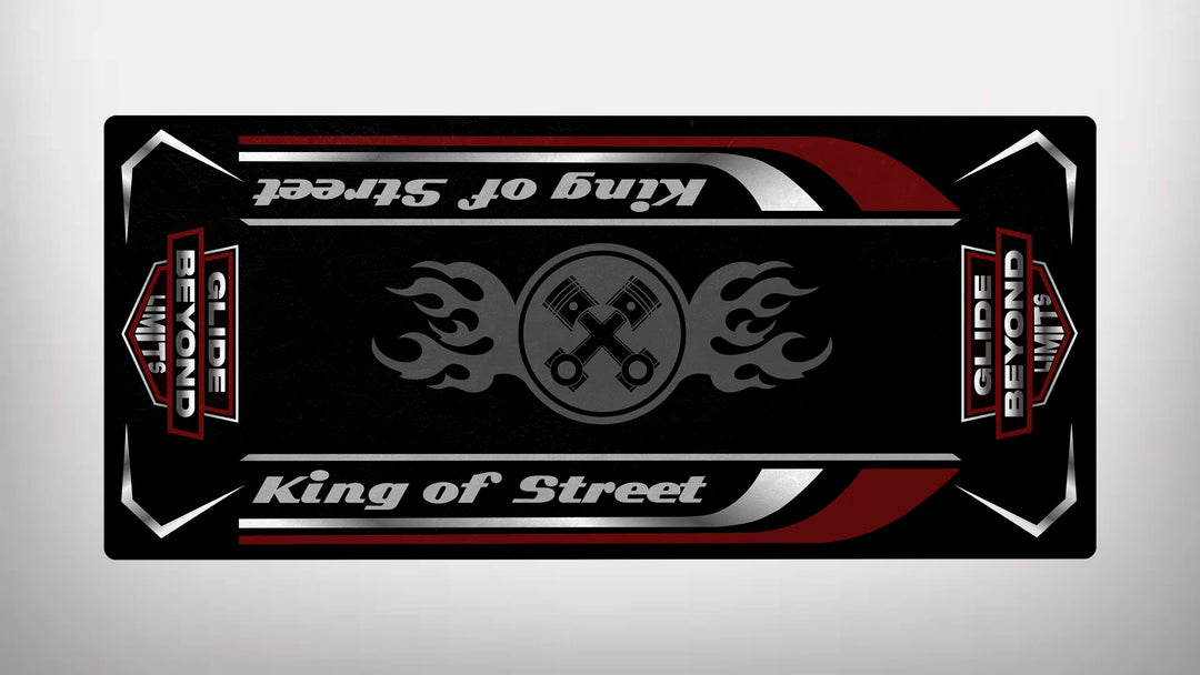 Rectangular card with King of Street text, featuring racing themes like flames and crossed pistons in vibrant red, black, and silver. It resembles a sleek motorcycle mat by Glide Beyond Limits.