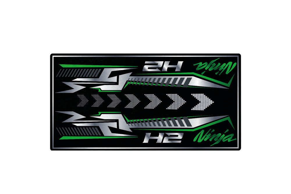 The Motorcycle Pit Mat for Kawasaki H2 displays dynamic angular shapes in green, white, and silver. The words 2H and H2 are stylized with Ninja, set on a black background with arrow patterns, evoking a sleek motorcycle garage mat design.