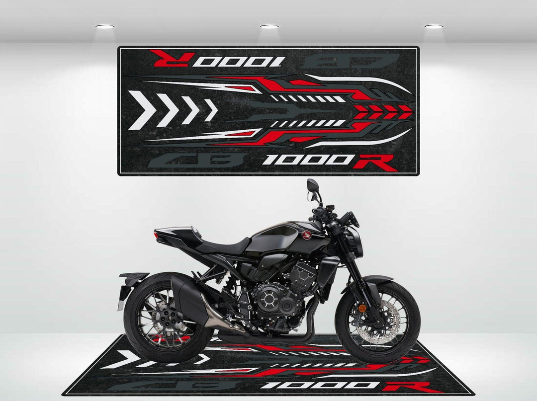 A sleek Honda CB1000R is showcased in a showroom, parked on a bold black and red Motorcycle Pit Mat. Above, a matching wall graphic amplifies the spaces visual allure.