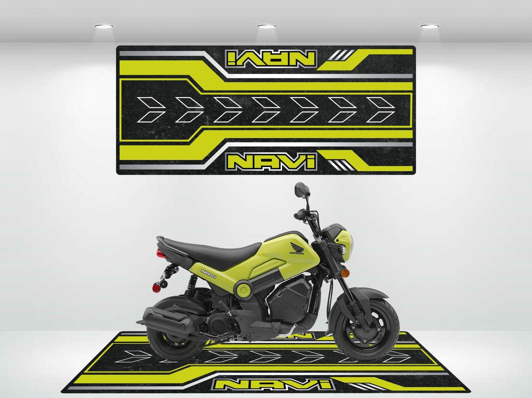 A lime green motorcycle is displayed atop a black and yellow Motorcycle Pit Mat for Honda Navi in a showroom, with Navi and arrow designs in the background. Overhead spotlights highlight its sleek design.