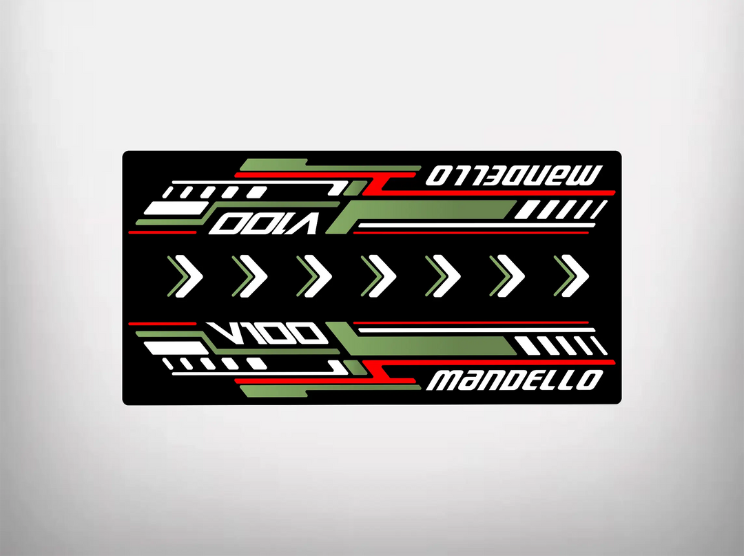 The Motorcycle Pit Mat brands Motorcycle Mat for Mandello V100 features a stylized, symmetrical design with V100, Mandello, and green, white, red diagonal stripes and arrows on a black background.