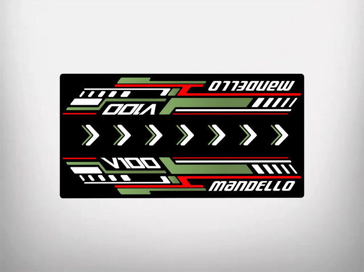 The Motorcycle Pit Mat brands Motorcycle Mat for Mandello V100 features a stylized, symmetrical design with V100, Mandello, and green, white, red diagonal stripes and arrows on a black background.