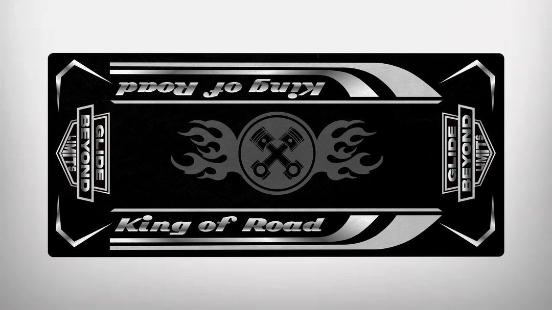 The Motorcycle Pit Mat brands Motorcycle Mat for King of Road - Glide Beyond Limits showcases a black and white design with crossed wrenches, flame motifs, and slogans like King of Road and Glide Beyond Limits, enhanced by stripes and decorative elements for an eye-catching appearance.