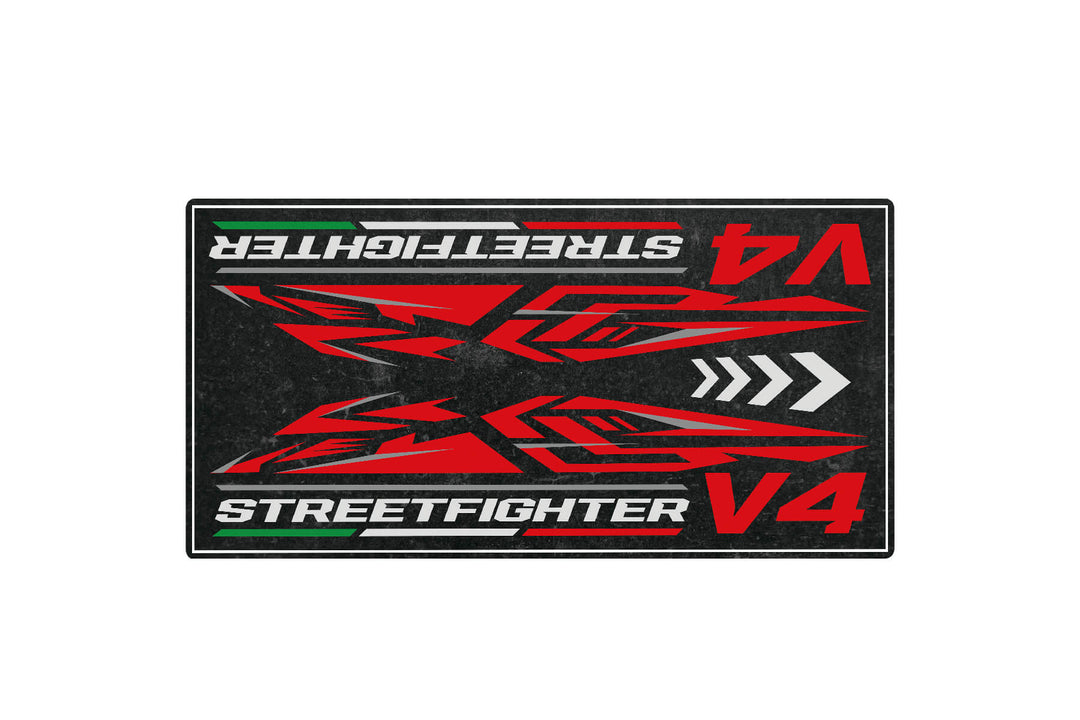 A Motorcycle Pit Mat for Street Fighter V4 showcases an abstract red and black design with mirrored angular patterns on a dark backdrop, evoking the essence of the motorcycle.