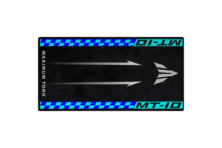 The Motorcycle Pit Mat for Yamaha MT-10 features a rectangular design with three gray arrows pointing upward. It has blue checkered borders, MAXIMUM TORK text on the left, and MT-10 along the edges, set against a dark background.